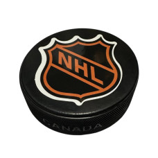 Шайба з символікою НХЛ . Оригінальна шайба з водостійкою наліпкою.